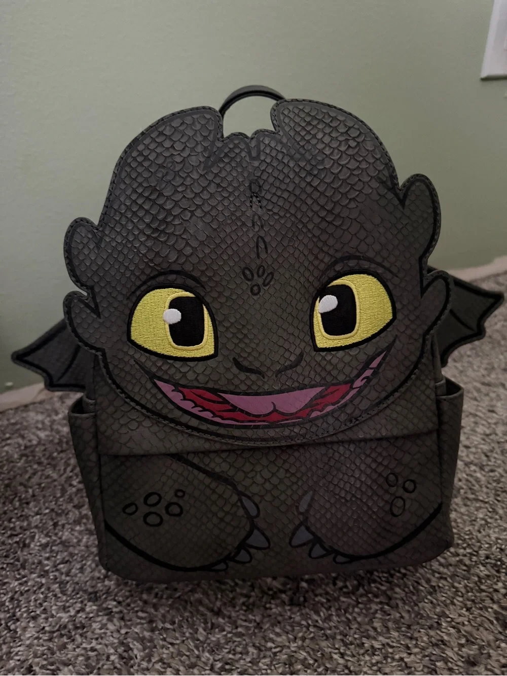 Loungefly Black Dragon Character Backpack with Yellow Eyes